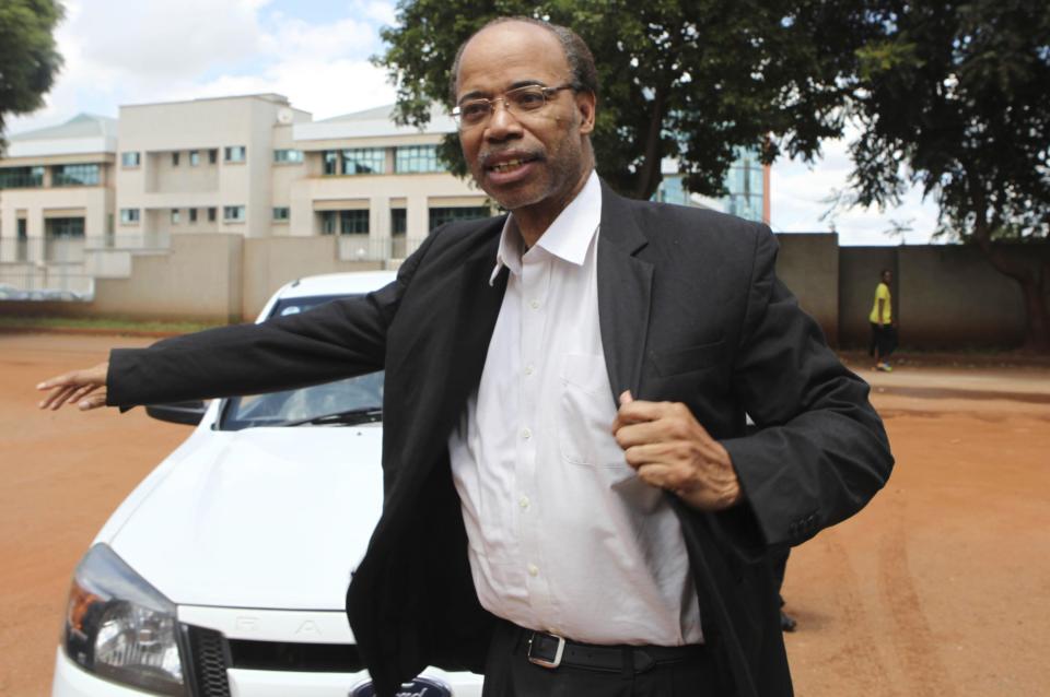 Former U.S. congressman Mel Reynolds arrives at the Harare Magistrates court, February 19, 2014. Reynolds has been arrested in Zimbabwe, an immigration official said on Tuesday, after state media reported the convicted sex offender had been found with pornography at a local hotel. Police and immigration officials were investigating Reynolds for living in the southern African country without a valid visa, Francis Mabika, an assistant regional immigration officer, told Reuters. REUTERS/Philimon Bulawayo (ZIMBABWE - Tags: POLITICS CRIME LAW)