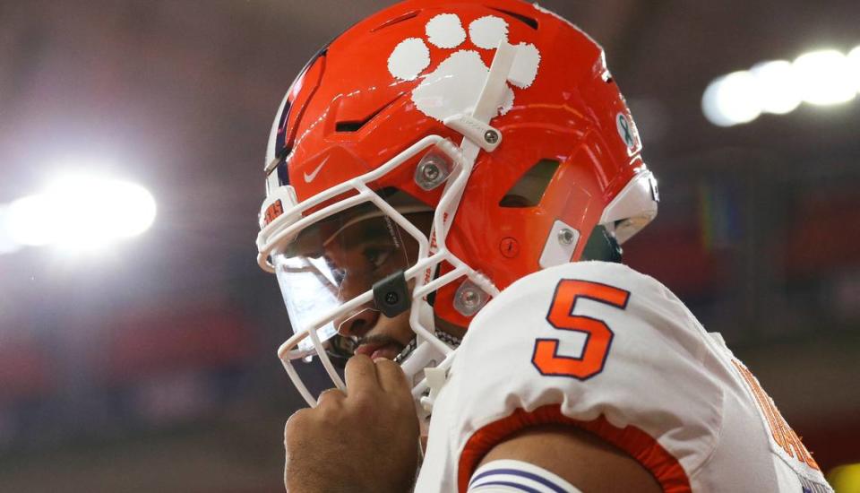 Clemson quarterback D.J. Uiagalelei heads onto the field as players warm up before the Syracuse game in October.