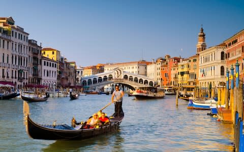 The Grand Canal in Venice - Credit:  Alan Copson/Getty