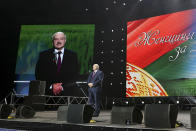 Belarusian President Alexander Lukashenko addresses a women's forum in Minsk, Belarus, Thursday, Sept. 17, 2020. Lukashenko has given a speech at a women's forum with some good quotes—he's announced Belarus will close the border with Ukraine, Poland and Lithuania, and is mobilizing half the army. (BelTA Pool Photo via AP)