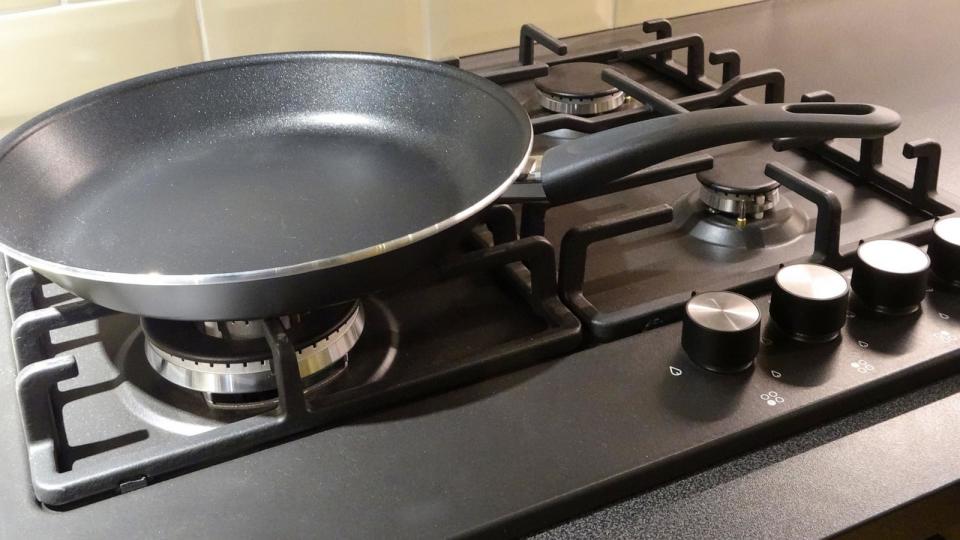 PHOTO: Image of non-stick frying pan, kitchen gas cooker hob rings (STOCK IMAGE/Getty Images)