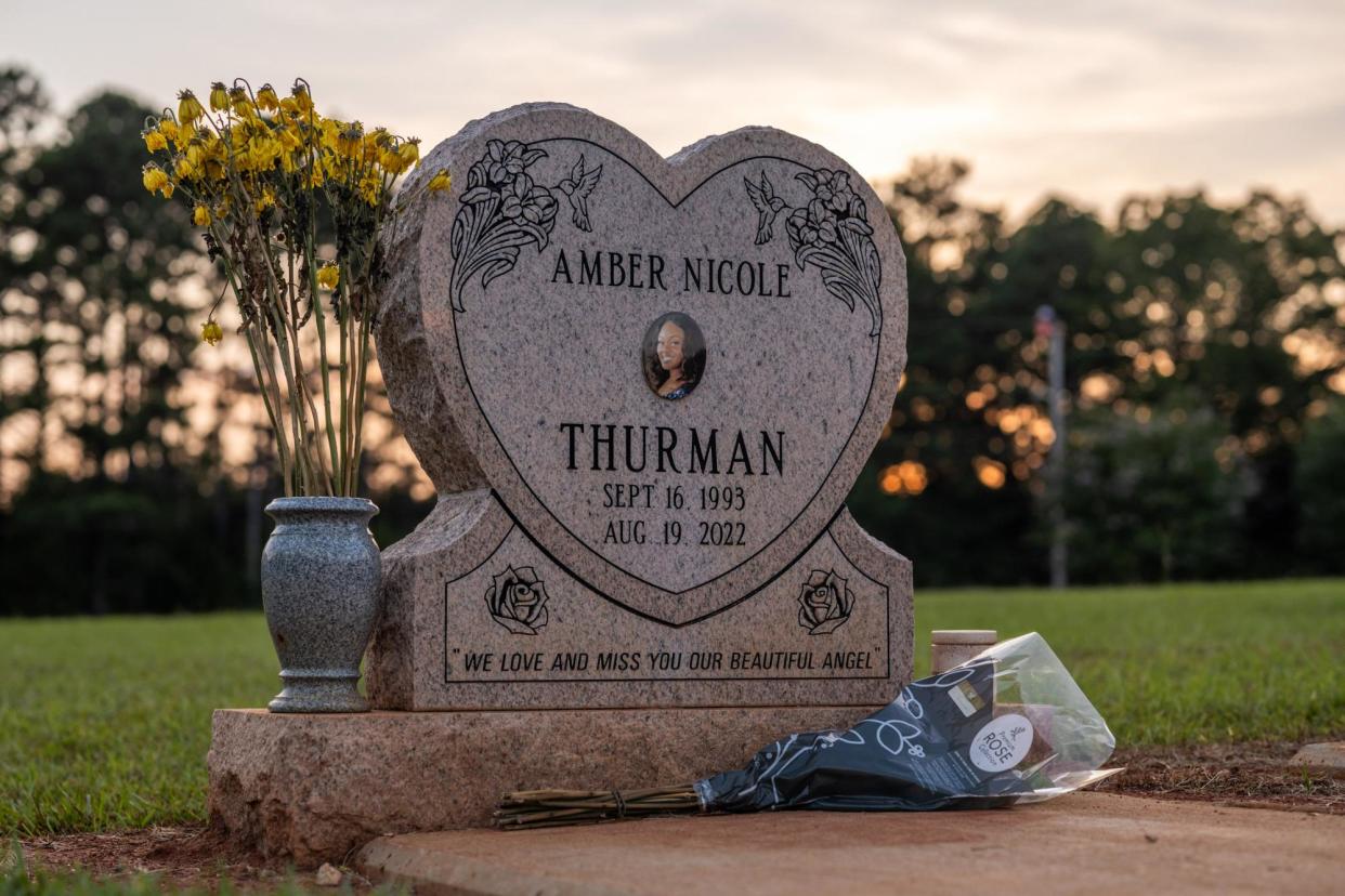 <span>The gravesite of Amber Thurman at Rose Garden cemetery in McDonough, Georgia, on 13 August 2024.</span><span>Photograph: Nydia Blas for ProPublica</span>