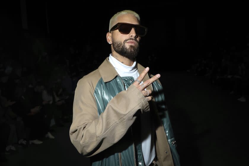 Juan Luis Londono Arias, known professionally as Maluma attends the Hermes Ready To Wear Fall/Winter 2022-2023 fashion collection, unveiled during the Fashion Week in Paris, Saturday, March 5, 2022. (Photo by Vianney Le Caer/Invision/AP)