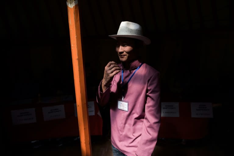 A polling station official waits for people to arrive to vote in the Mongolian presidential election at the Erdene Sum Ger (Yurt) polling station in Tuul Valley