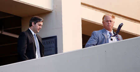 Former North Charleston police officer Michael Slager (L) is escorted from the courthouse by security personnel while waiting on his verdict at the Charleston County Courthouse in Charleston, South Carolina December 1, 2016. REUTERS/Randall Hill