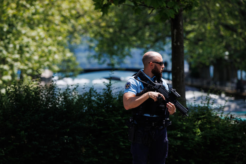 ANNECY, FRANCE - JUNE 08: Law enforcement stand near Paquier park where a man stabbed multiple people on June 8, 2023 in Annecy, France. Four children were among the victims in a knife attack in the southeastern French town of Annecy. (Photo by Richard Bord/Getty Images)