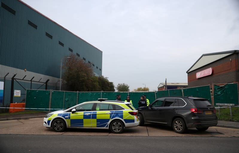 The scene where bodies were discovered in a lorry container, in Grays, Essex