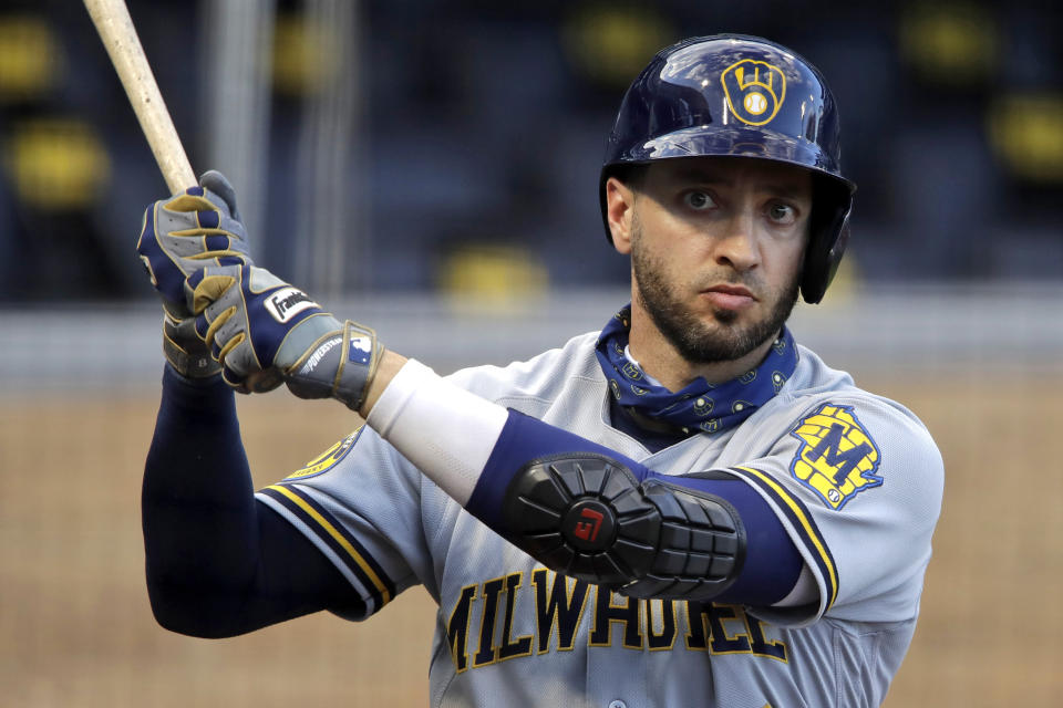 FILE - In this July 28, 2020, file photo, Milwaukee Brewers' Ryan Braun warms up on deck during the first inning of a baseball game against the Pittsburgh Pirates in Pittsburgh. Braun, the Brewers' home run leader whose production was slowed by injuries during the second half of his 14-year career, announced his retirement on Tuesday, Sept. 14, 2021. Braun hasn’t played all season and said during spring training that he was leaning toward retirement. (AP Photo/Gene J. Puskar, File)