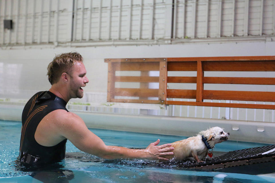 Casteel helps&nbsp;"fearless" Harrod out of the pool on a ramp.