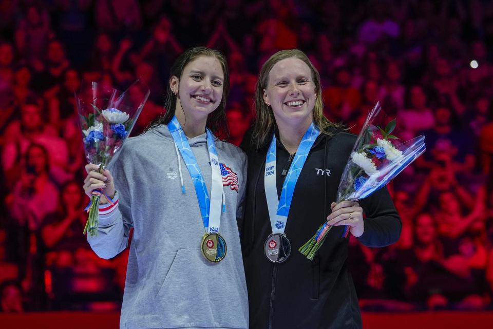 Lilly King and Kate Douglass celebrate after the Women's 200 breaststroke finals Thursday, June 20, 2024, at the US Swimming Olympic Trials in Indianapolis. (AP Photo/Darron Cummings)