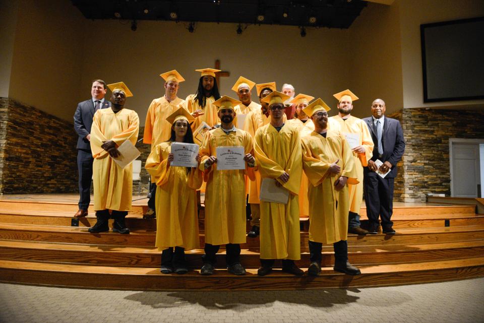 The Jackson Day Reporting Center Class takes a group photo after the 2023 Jackson Day Reporting Center Graduation inside Englewood Baptist Church on Tuesday, Mar. 21, 2023. 