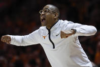 Texas interim coach Rodney Terry yells to players during the first half of an NCAA college basketball game against Tennessee, Saturday, Jan. 28, 2023, in Knoxville, Tenn. (AP Photo/Wade Payne)