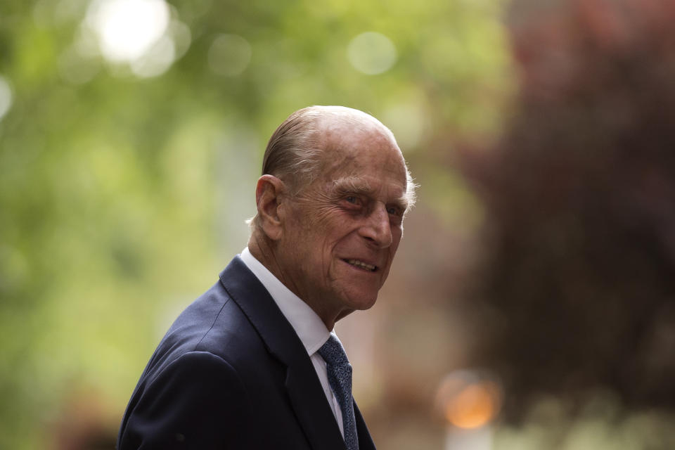 FILE - In this Monday, June 8, 2015 file photo, Britain's Prince Philip, the husband of Queen Elizabeth II, arrives for a visit to Richmond Adult Community College in Richmond, south west London. On what would have been Prince Philip's 100th birthday, his youngest child Prince Edward, Earl of Wessex, said in an interview with the BBC broadcast on Thursday June 10, 2021, he would not have been looking forward to any celebrations to mark the occasion. (AP Photo/Matt Dunham, Pool, File)