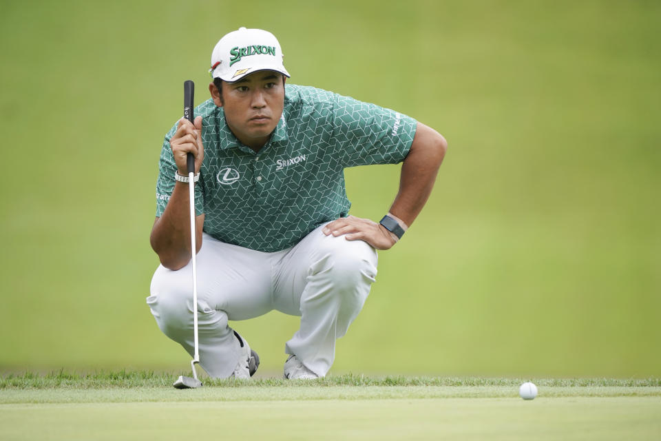 Hideki Matsuyama of Japan lines up a putt on the third green during the third round of the Zozo Championship golf tournament at Accordia Golf Narashino Country Club on Saturday, Oct. 15, 2022 in Inzai, Chiba Prefecture, east of Tokyo, Japan. (AP Photo/Tomohiro Ohsumi)