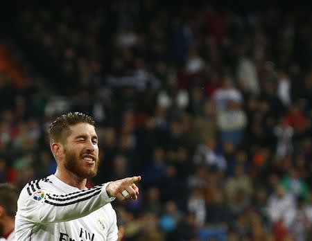 Real Madrid's Sergio Ramos celebrates his goal against Rayo Vallecano during their Spanish first division soccer match at Santiago Bernabeu stadium in Madrid November 8, 2014. REUTERS/Andrea Comas