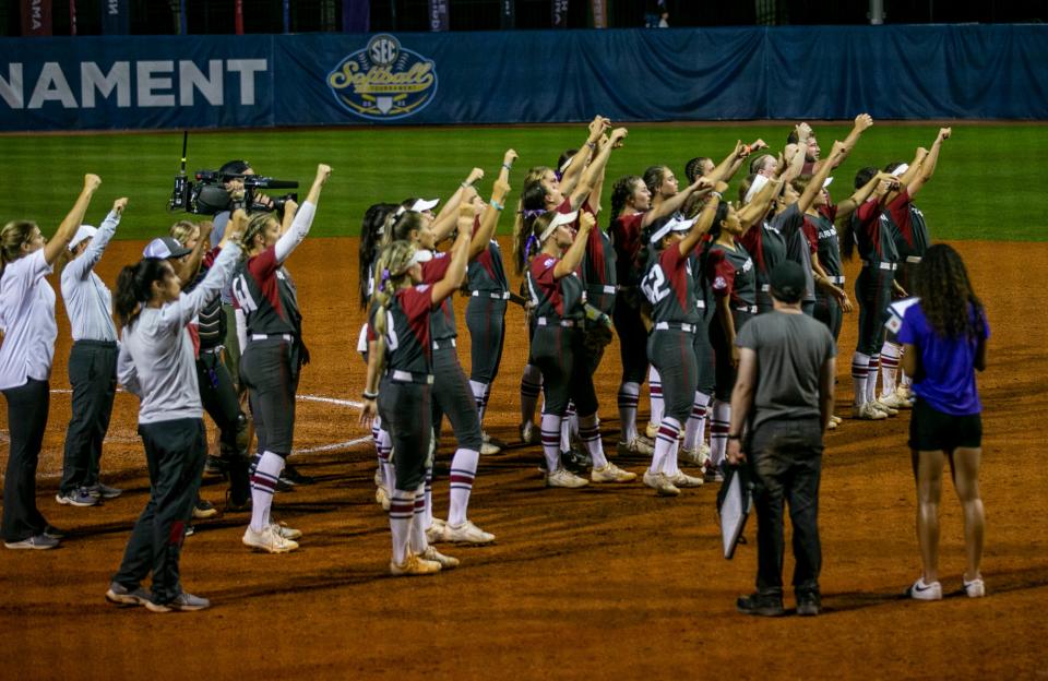 Arkansas celebrates its 4-1 win over Florida in the semifinals of the SEC Tournament, Friday, May 13, 2022, at Katie Seashole Pressly Stadium in Gainesville, Florida. The Razorbacks move on to the championship game. [Cyndi Chambers/ Special to the Sun] 2022