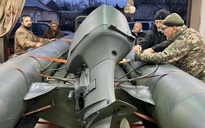 A small boat that was taken from the UK to Ukraine, repaired and then delivered to the front line