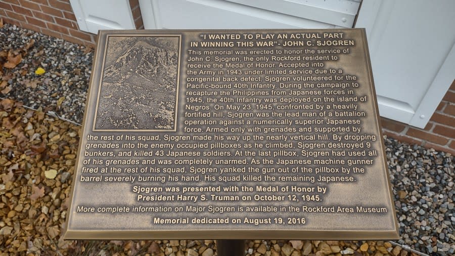 An undated courtesy photo of the plaque next to the statue dedicated to John C. Sjogren located at the Rockford Area Museum.