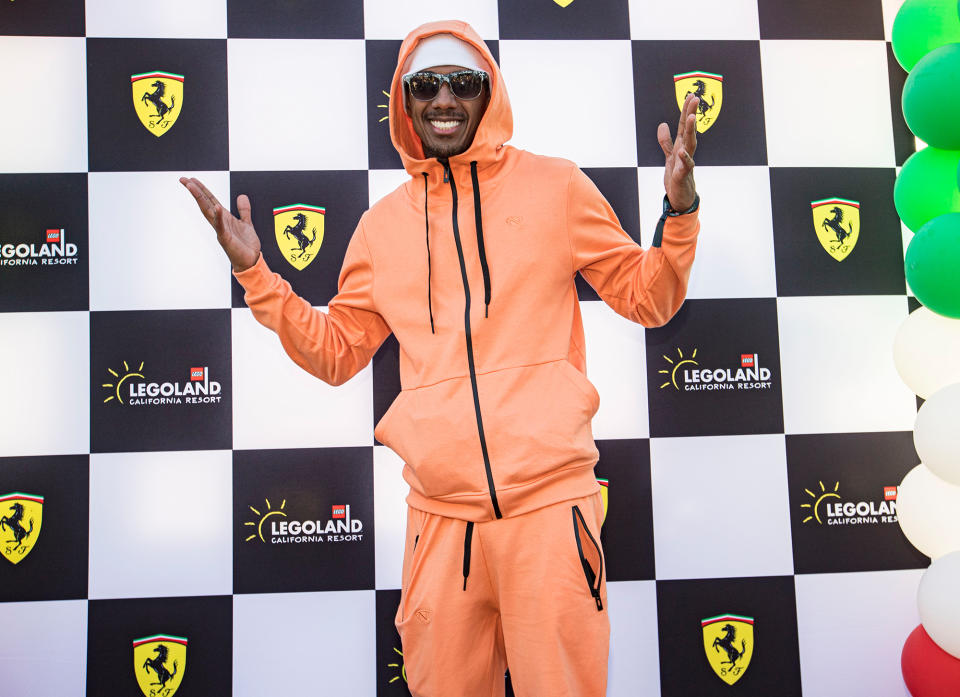 <p>In Carlsbad, California, Nick Cannon poses for photos at LEGOLAND California on May 11.</p>