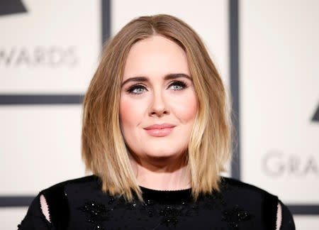 Singer Adele arrives at the 58th Grammy Awards in Los Angeles, California February 15, 2016. REUTERS/Danny Moloshok/File Photo