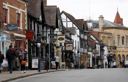 FILE PHOTO: Visitors and shoppers walk along Sheep street in the centre of Stratford-upon-Avon