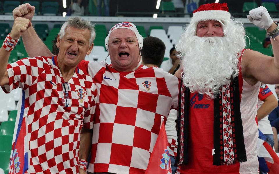 Croatia supporters cheer ahead of the start of the Qatar 2022 World Cup quarter-final football match between Croatia and Brazil at Education City Stadium - Jack Guez/Getty Images