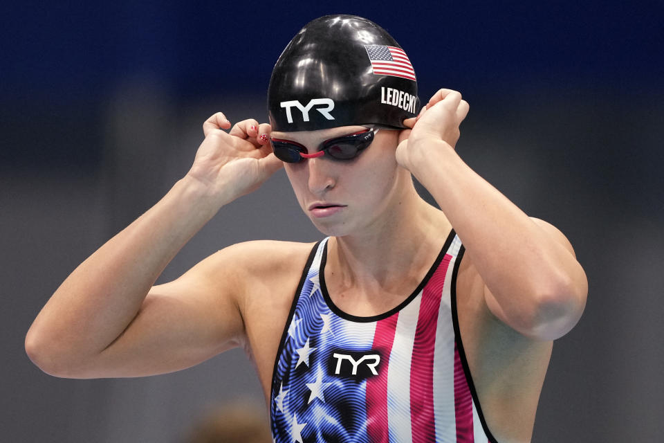 Katie Ledecky of United States prepares for her swim in the women's 200-meter freestyle semifinal at the 2020 Summer Olympics, Tuesday, July 27, 2021, in Tokyo, Japan. (AP Photo/Matthias Schrader)