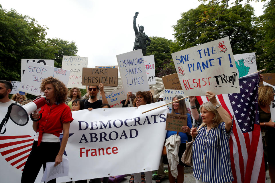 People gather to protest the visit of U.S. President Donald Trump in Paris on July 13, 2017. (Photo: Pascal Rossignol/Reuters)