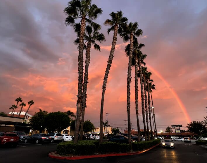 A partial rainbow shows along with a muggy, cloudy sky at the Quad at Whittier in Whittier on the evening of Sunday, Sept. 11, 2022. A blistering heat wave hit the area last week.