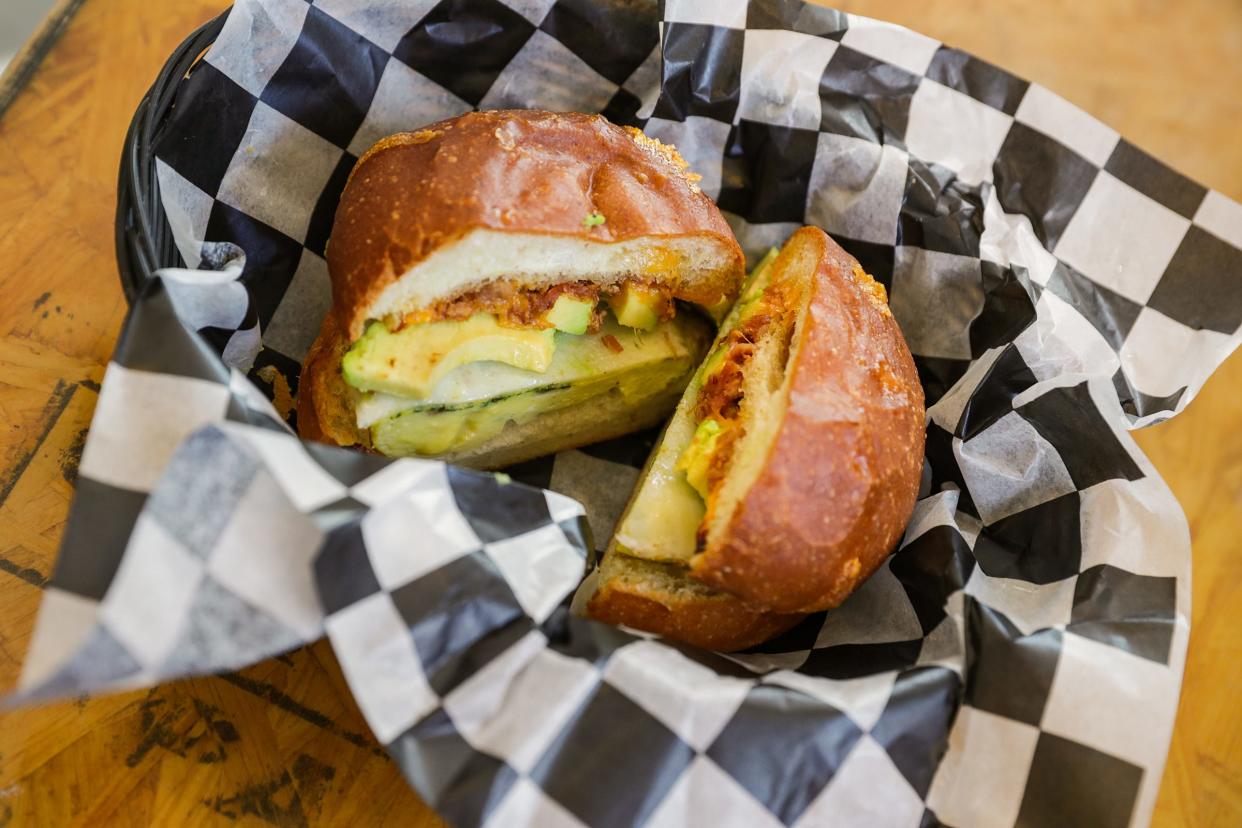 The all day breakfast sandwich, with Amelia's brioche bun, herbed eggs, cheddar and provolone cheese and added avocado and bacon, is one item served at Foundry Provisions, seen on Friday, September 18, 2020, in the Old Northside neighborhood of Indianapolis. Recent changes to the coffee shop and cafe include new kitchen equipment for faster food preparation, ingredient upgrades, interior renovations and the menu now includes ice cream.