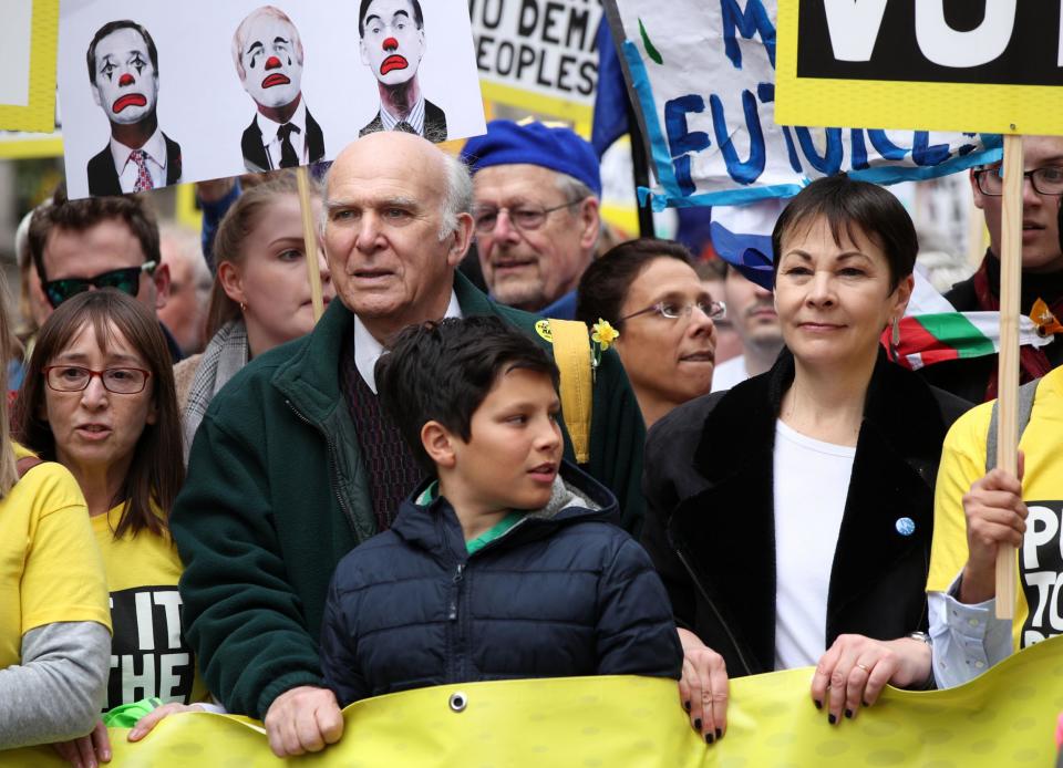 Sir Vince Cable and Caroline Lucas were seen at the march (PA)