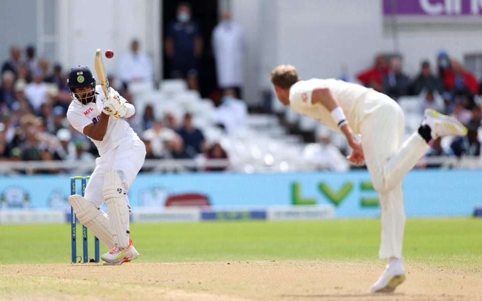 Stuart Broad of England bowls a bouncer at Kannaur Rahul  - Eddie Keogh/Getty Images