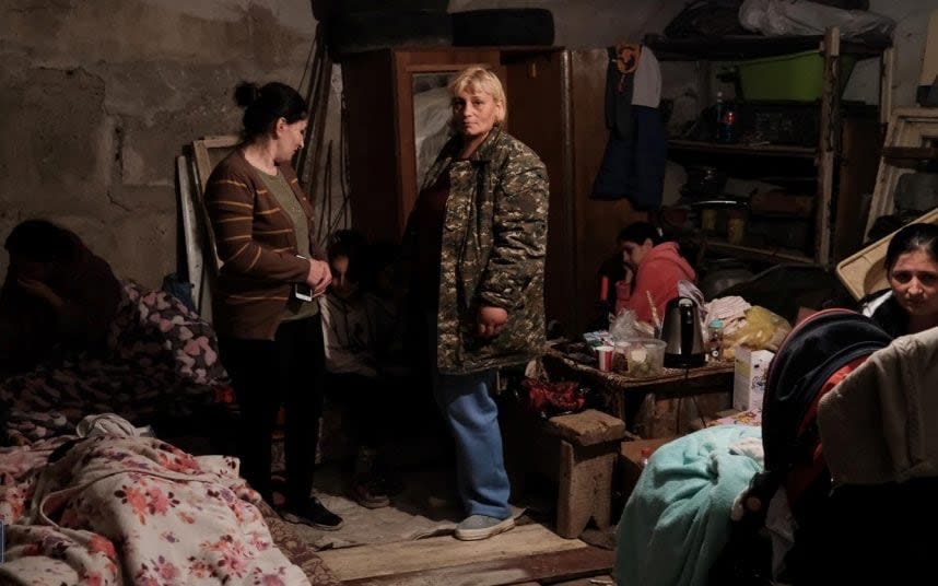 Residents hide in a bomb shelter in Stepanakert. CREDIT: ARMENIAN FOREIGN MINISTRY - ARMENIAN FOREIGN MINISTRY