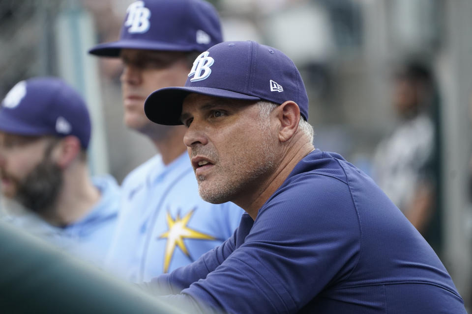 Tampa Bay Rays manager Kevin Cash wacthes from the dugout during the first inning of a baseball game against the Detroit Tigers, Friday, Aug. 4, 2023, in Detroit. (AP Photo/Carlos Osorio)