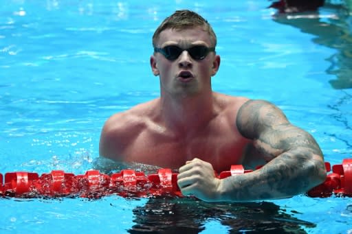 Britain's Adam Peaty celebrates winning the final of the men's 100m breaststroke at the 2019 World Championships in Gwangju, South Korea