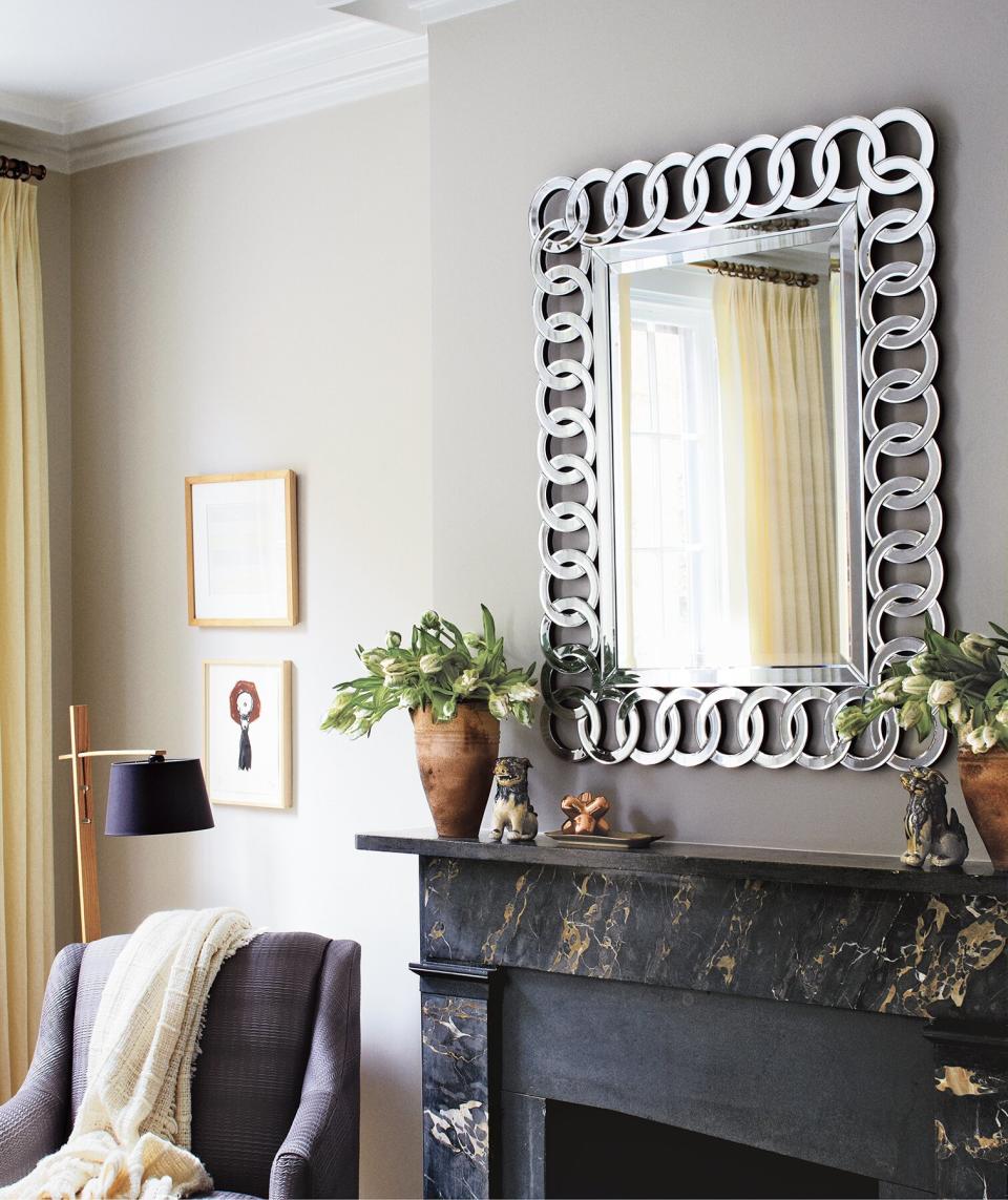 Bold mirror over fireplace