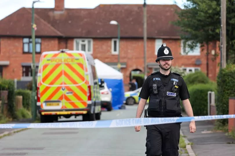 Police and forensics officers at the scene in Shrewsbury