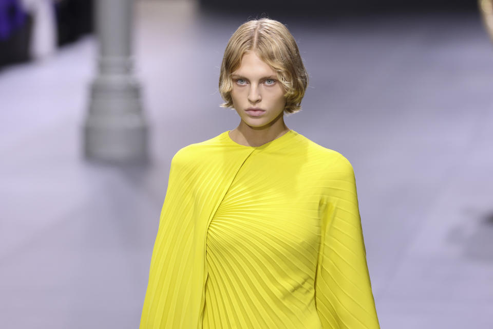 A model wears a creation for the Valentino ready-to-wear Spring/Summer 2023 fashion collection presented Sunday, Oct. 2, 2022 in Paris. (Photo by Vianney Le Caer/Invision/AP)