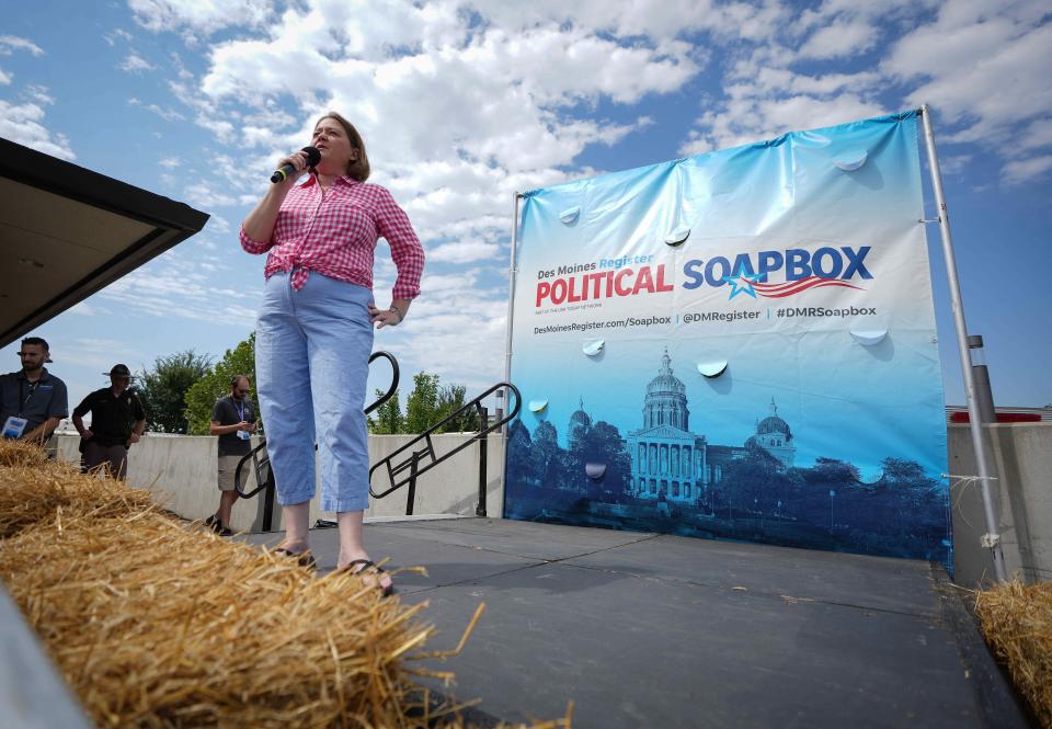 Brenna Bird, the Republican candidate for Iowa attorney general, speaks at the Des Moines Register Political Soapbox during the Iowa State Fair in on Saturday, Aug. 13, 2022, in Des Moines.