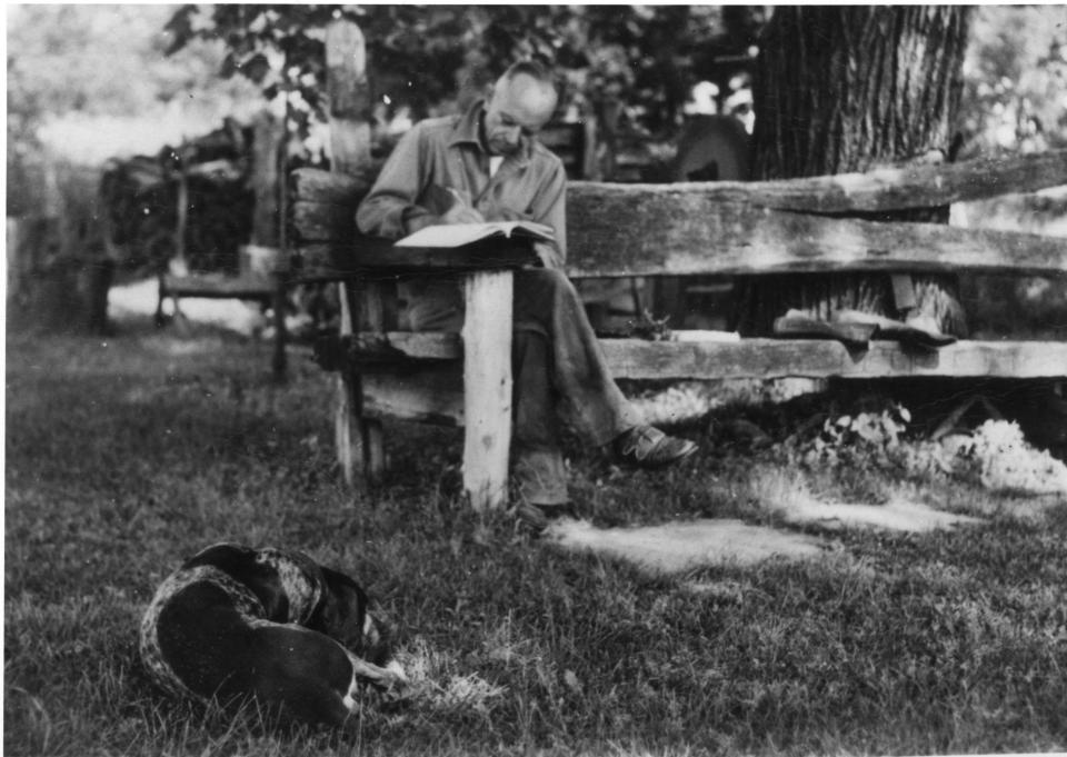 Aldo Leopold, author of "A Sand County Almanac," writes in a journal on his family's farm in Sauk County.