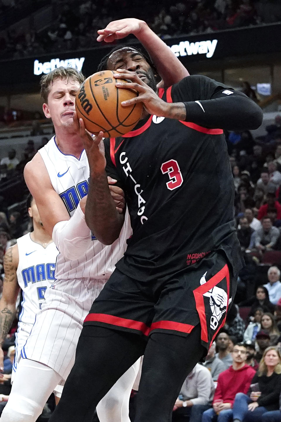 Orlando Magic center Moritz Wagner, left, guards against Chicago Bulls center Andre Drummond (3) during the second half of an NBA basketball game in Chicago, Friday, Nov. 17, 2023. (AP Photo/Nam Y. Huh)