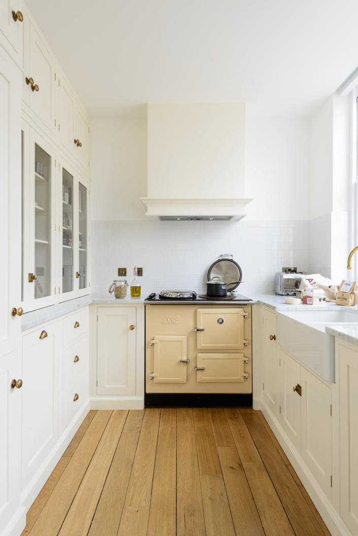 <p> Storage is clearly king when it comes to the small kitchen and this is where bespoke, made-to-measure designs as part of the layout really come into their own. The flexibility of having non-standard door sizes, clever corner cabinets and tailor-made carcasses at your fingertips is a huge plus point for small kitchen layouts.&#xA0; </p> <p> One way to max out storage possibilities in a small kitchen is to stretch cabinets all the way to the ceiling &#x2013; this will also eliminate that awkward space on top of cabinets that collect dust. Use high-up storage for items you use infrequently such as party platters and seasonal gadgets like ice-cream makers and slow cookers. </p> <p> &#x2018;Here, glazed and closed storage covers a whole wall from floor to ceiling,&#x2019; explains Helen Parker, creative director of&#xA0;deVOL. &#x2018;We usually like to stick to our standard-sized cupboards to keep costs down for our customers, but there is always the option of a special bespoke piece, made and fitted for an awkward space or alcove to maximize storage, and that&#x2019;s just what was needed here.&#x2019; </p>
