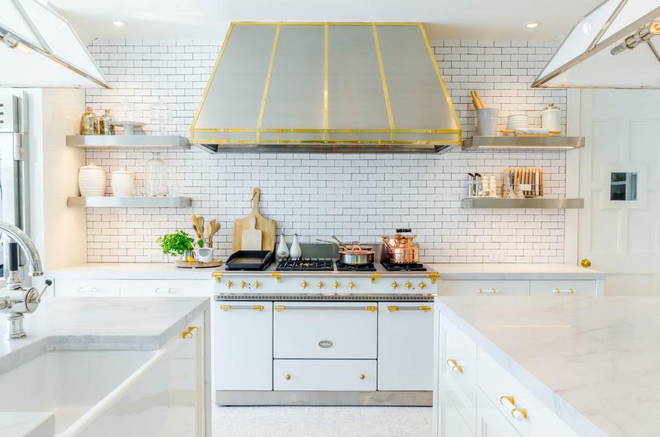 a kitchen with white cabinets