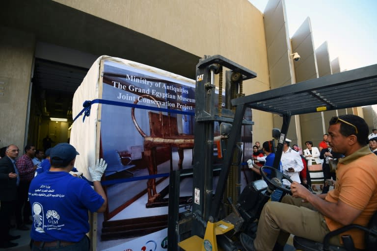 The gilded bed of King Tutankhamun arrives at the newly constructed Grand Egyptian Museum on Cairo's outskirts near the Giza Pyramids on May 23, 2017