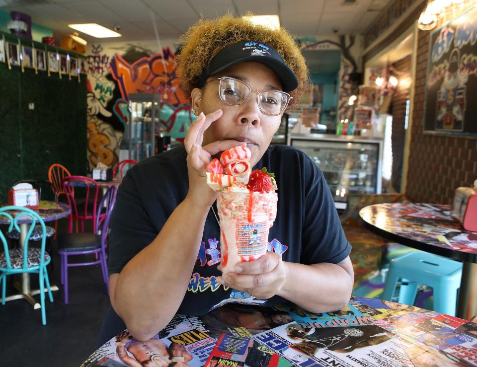 Lafesa Johnson, owner of the Hip Hop Sweet Shop, with one of her creations, a strawberry cheesecake milkshake.