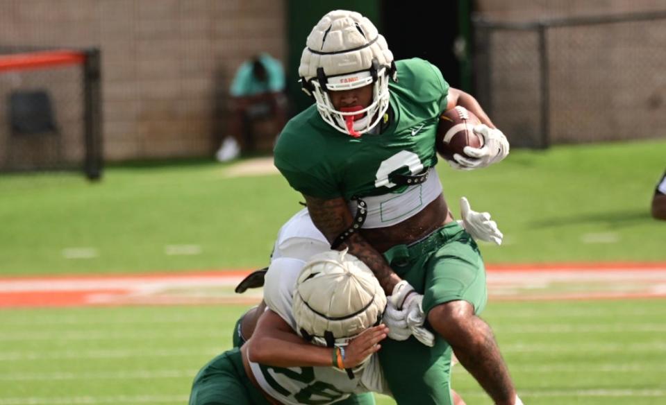 Florida A&M Rattlers tight end Jeremiah Pruitte (0) attempts to dodge a tackle during the team's second scrimmage of spring football at Bragg Memorial Stadium in Tallahassee, Florida on Saturday, April 1, 2023.