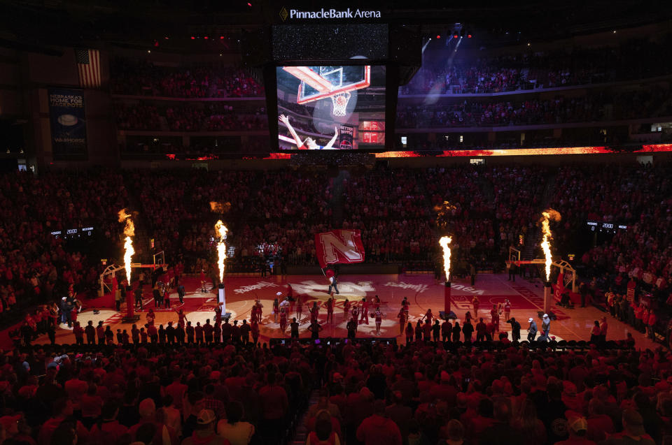 Nebraska mascot Herbie Husker waves the school flag during team introductions before Nebraska plays against Michigan in an NCAA college basketball game, Saturday, Feb. 10, 2024, in Lincoln, Neb. (AP Photo/Rebecca S. Gratz)