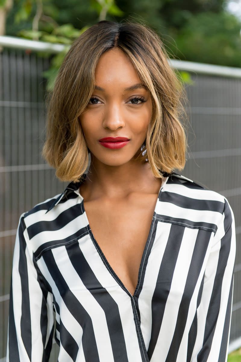 <p> Dunn subtly incorporates waves into her look by only twisting the front pieces. </p>
