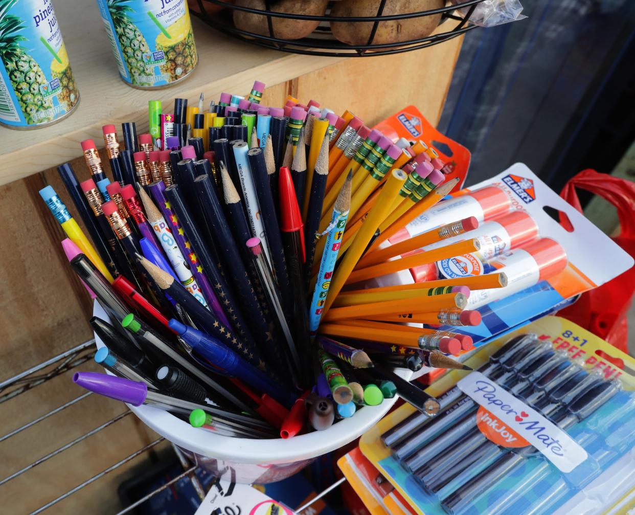 School supplies are pictured at the Food is Free pantry in Milwaukee in 2020. As many families are unable to afford school supplies for the new school year, teachers are raising funds to help.