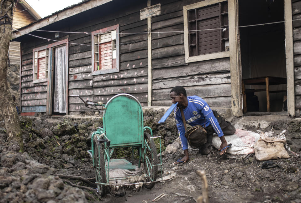 Paul Mitemberezi, a market vendor who has been disabled since he was 3 because of polio, leaves his house for the North Kivu Paralympic League, in Goma, democratic Republic of Congo, Tuesday Jan. 17, 2023. When Pope Francis arrives in Congo and South Sudan Jan. 31, thousands of people will take special note of a gesture more grounded than the sign of the cross. Watching from their wheelchairs, they will relate to the way he uses his. (AP Photo/Moses Sawasawa)